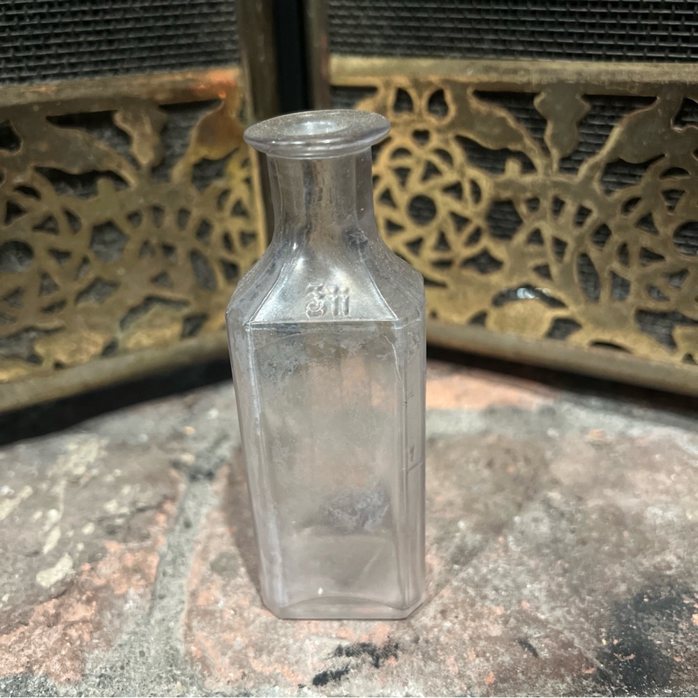Vintage purple apothecary bottle